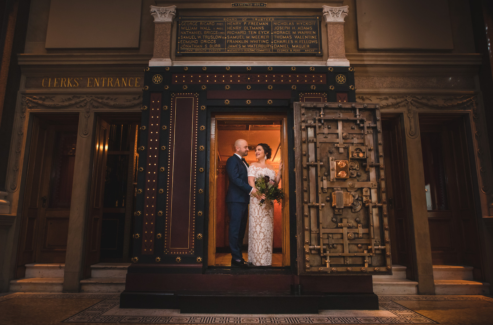 2019 Wedding couple poses in the bank vault at Weylin in NYC