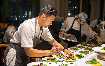 Founder and Chef Winston Chiu plating steak second course for Food + Tech dinner event